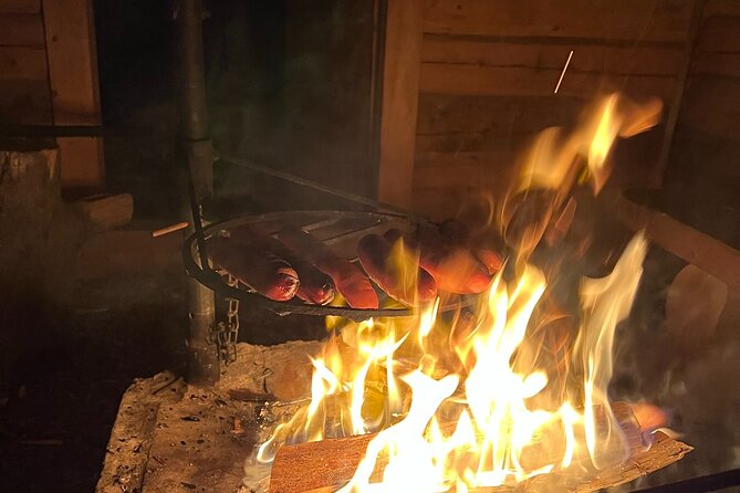 Arctic Reindeer Farm Experience with Snowshoeing in the Wild - Snowshoeing across a frozen lake into the forest