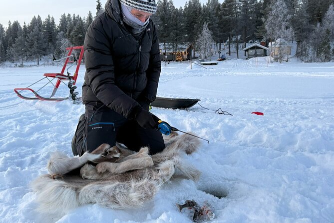 Authentic Reindeer Experience and Ice Fish with Lunch in the Wild - Ice Fishing the Lappish Way, Drill, Wait, and Learn