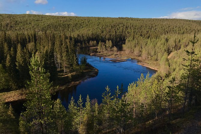 Canoe Trip in Lapland - The open-fire finale: flint and steel, Finnish snacks, and hot drinks