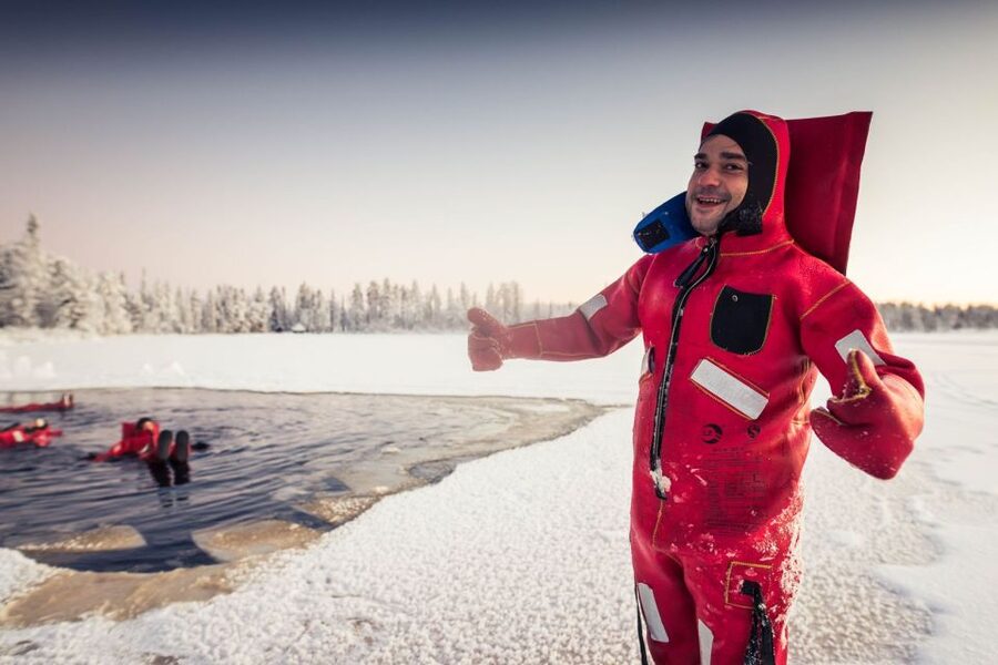 Daytime Ice Floating Rovaniemi, Frozen Lake Experience - The rescue suit and “help-in, help-out” setup