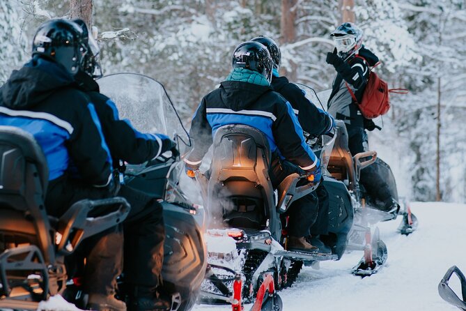 Evening Snowmobile Safari in Rovaniemi - The shared snowmobile setup: driving rules and how passengers are seated