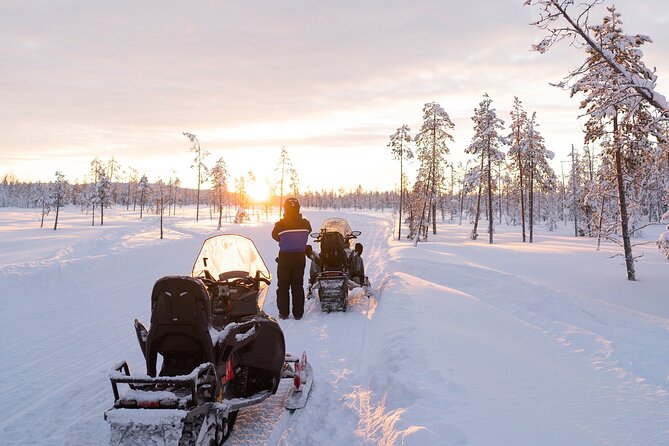 Evening Snowmobile Safari in Rovaniemi - The Arctic Circle snow route at night: speed, headlights, and bumps