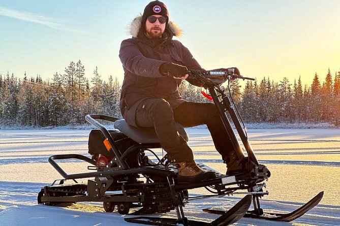 Expedition "INTO THE WILD" Safari and Lunch in Glass Igloo - The scooter ride through the forest snow