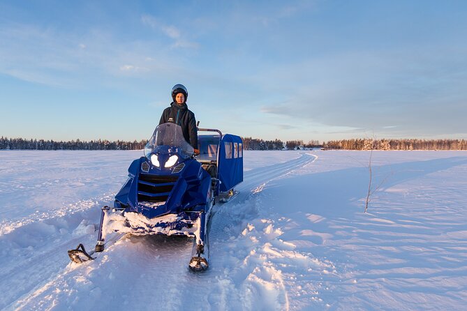 Family Snowmobiling in Rovaniemi, Apukka Resort - Mini-snowmobiles in the safe yard: fun for kids, with realistic expectations