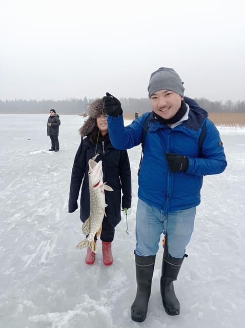 From Helsinki: Bodom Lake Ice Fishing with Food & Drinks - Ice drilling and pilkki: the lesson that stops you from guessing