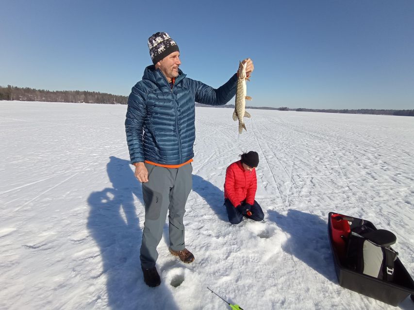 From Helsinki: Bodom Lake Ice Fishing with Food & Drinks - Campfire in a laavu: when the cold turns fun