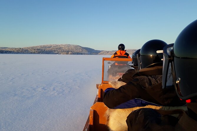 From Ivalo: Ice Fishing Safari to Lake Inari, reindeers & lunch - Lake Inari Ice Fishing: Waiting for Bites on a Giant Frozen Lake