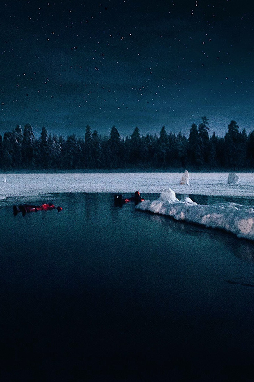 From Rovaniemi: Ice Floating under Aurora Borealis - Entering the water: what it feels like and what you should do
