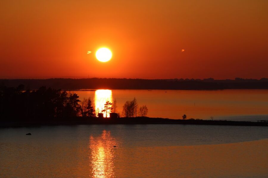 From Rovaniemi: Midnight Sun Forest Lake Float - Midnight Sun Lake Float: what 2.5 hours actually feels like