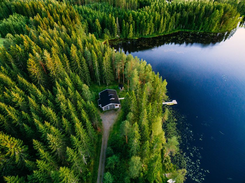 From Rovaniemi: Midnight Sun Forest Lake Float - Drifting on a pure forest lake while the sun never really leaves