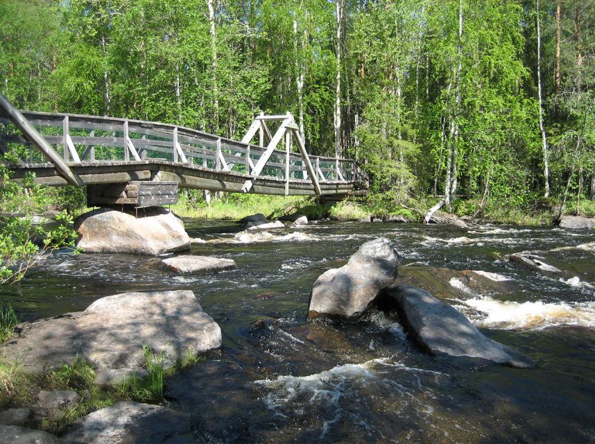 From Rovaniemi: Vikaköngäs Forest Hiking Tour - Crossing the wooden hanging bridge, hearing the gorge water
