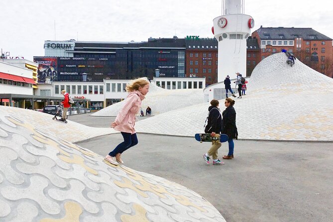 Helsinki walking tour with a city planner - Runeberg statue and Svenska Teatern, culture beyond the usual tourist list