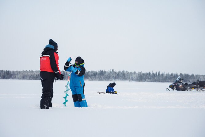 Ice Fishing and Snowmobile Safari Combo in Lapland - Ice fishing on the frozen lake: hands-on drilling and technique time