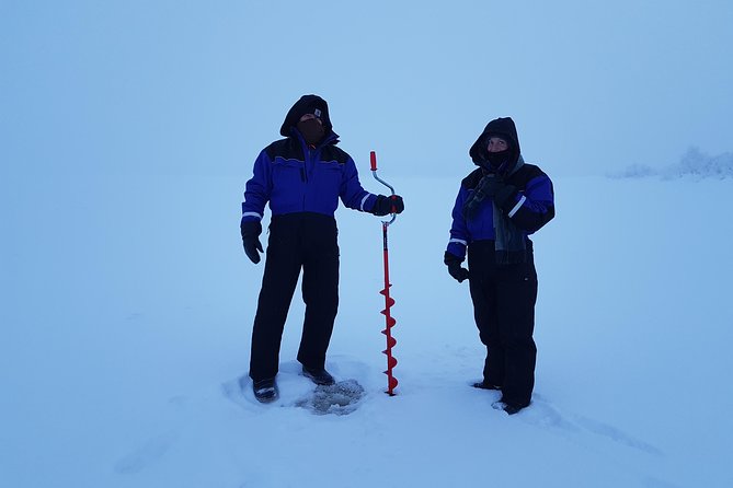 Ice fishing by car with hot beverages at Pyhä-Luosto - How the Pyhä-Luosto Car Pickup Sets the Tone