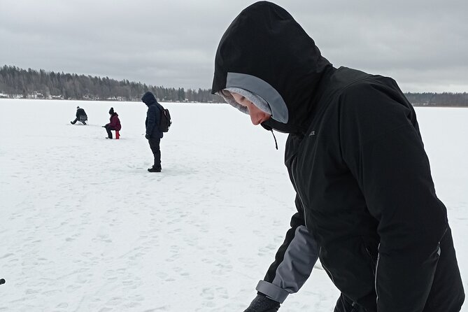 Ice fishing experience with Backpacker Helsinki Tour - Meeting at Museokatu 8 and getting your winter start right