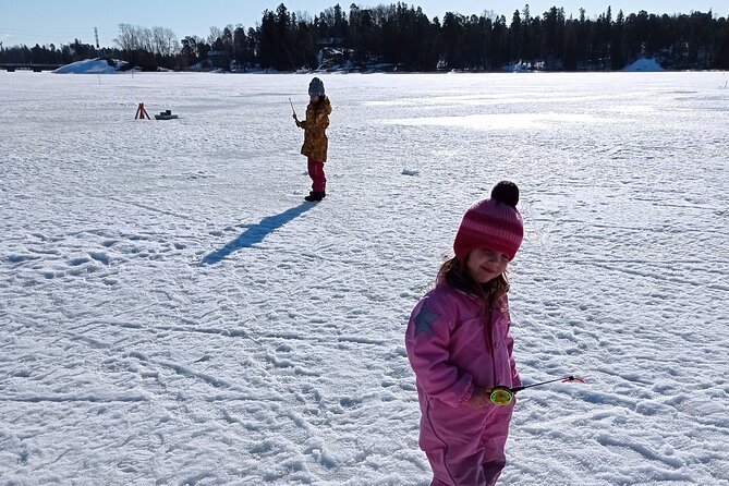 Ice fishing experience with Backpacker Helsinki Tour - The lakeside goal: perch, pike, and pike-perch odds