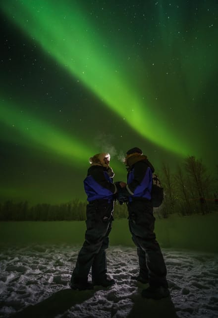 Ivalo: Lake Inari Northern Lights Tour w/ Reindeer & Dinner - Tina and Tapio’s island stop: teepees, a wooden cottage, and warm drinks