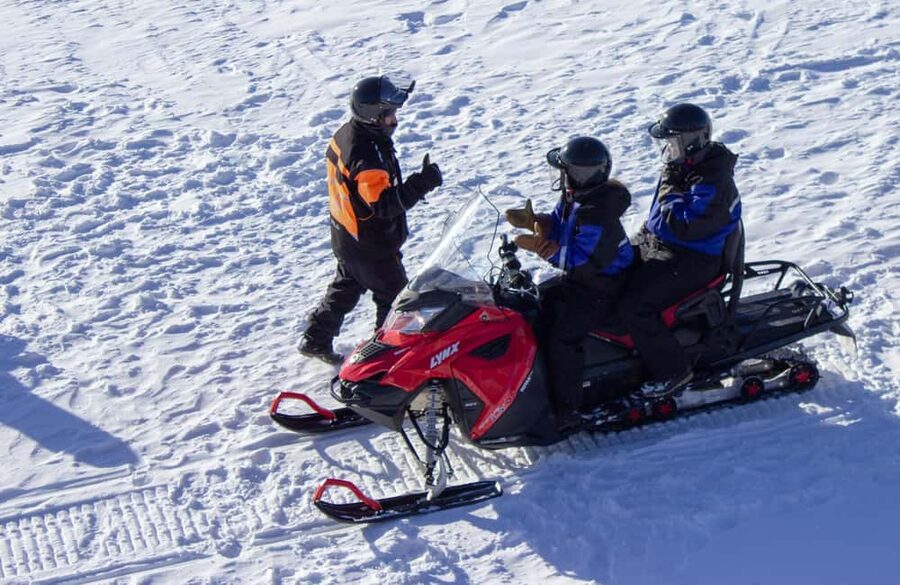 Levi: Snowmobile Safari to the Levi Nature - Family-friendly setup: kids in the sled, adults on the snowmobile