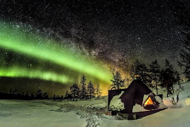 Northern Lights Snowmobile Sleigh Ride - Wooden watchtower on the summit: your horizon check