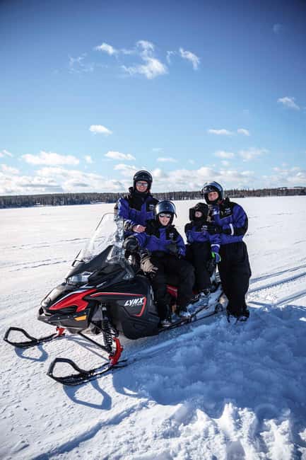 Rovaniemi: Family Snowmobiling Trip - Adults Drive Together, Kids Ride Warm in a Covered Sled