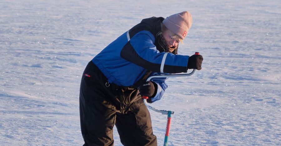 Rovaniemi: Ice-Fishing like a Finn - Waiting by the Fire, with Hot Drinks and Light Snacks