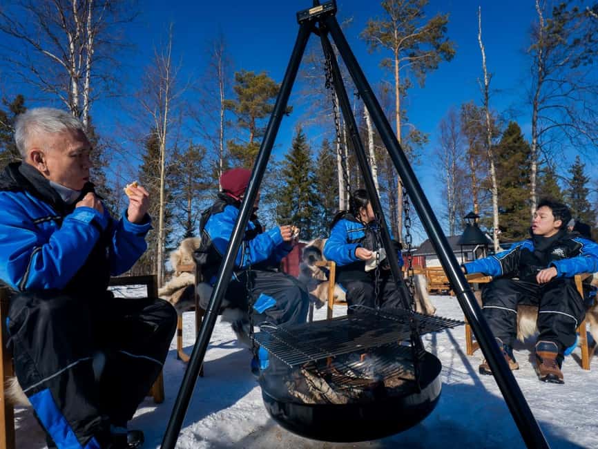 Rovaniemi: Ice Fishing Small Group Tour & Barbeque - Getting picked up, getting dressed, and packing smart