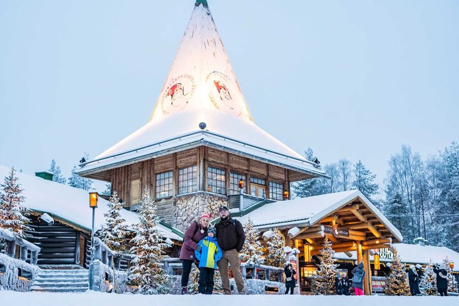 Rovaniemi: Private Pro Photoshoot in Santa Claus Village - Santa Claus Village photos, with someone else running the camera plan