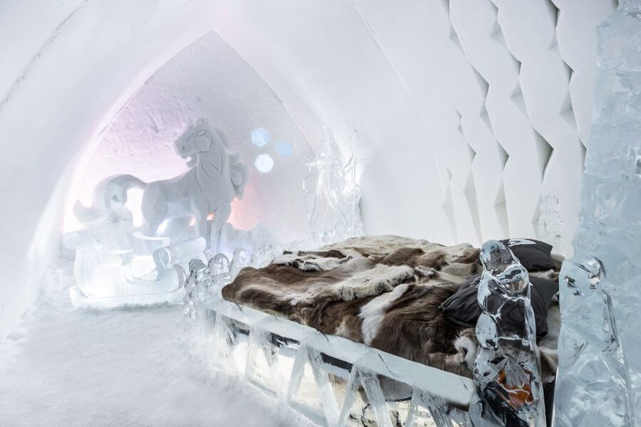 Rovaniemi: Snow Hotel Tour with Food by the Fire - Open-fire dinner by the logs: glow-fried salmon and Lapland comfort food