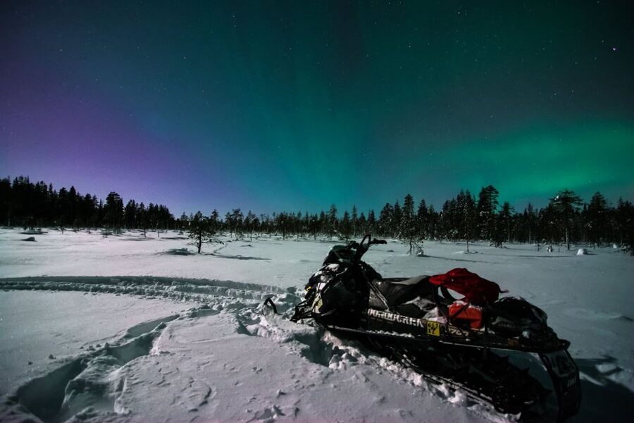 Saariselkä: Evening Snowmobile Tour with Fire & picnic - The guided ride: headlight work through forest, swamps, and hills
