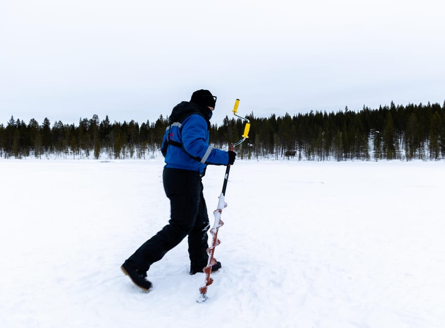 Saariselkä: Ice Fishing Safari by Snowmobile - Lapponia Tours Safari House: Where Winter Gear Becomes Comfort