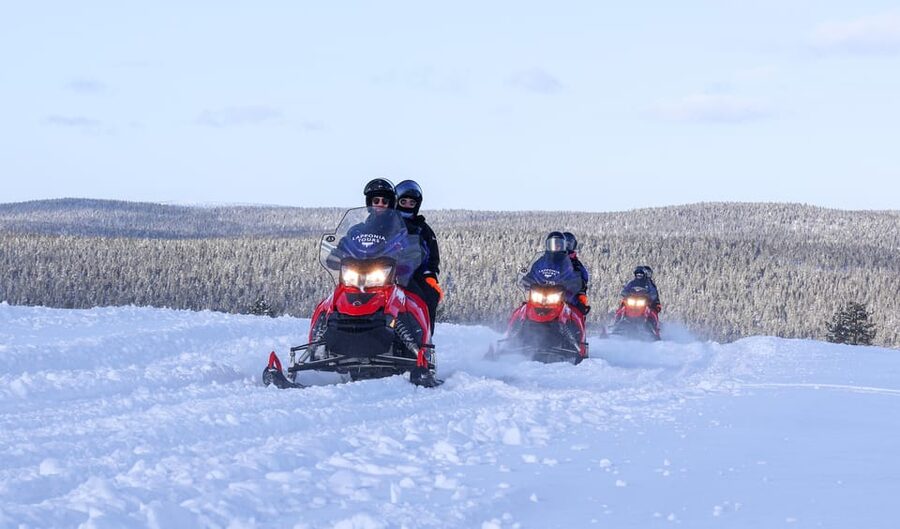 Saariselkä: Ice Fishing Safari by Snowmobile - Riding Across Snowy Forests and Open Fells to the Wilderness Lake