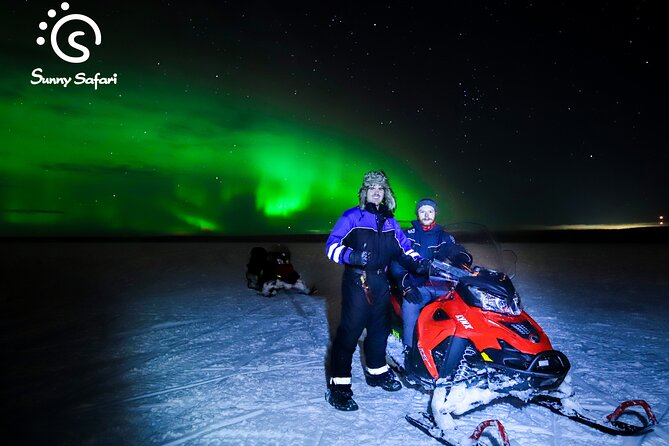 Searching Aurora with Snowmobile - Campfire break, hot drinks, and warming up for round two