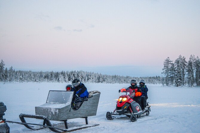 Small-Group Snowmobile Experience in Rovaniemi - The bonfire break: sausages, warm juice, and local stories