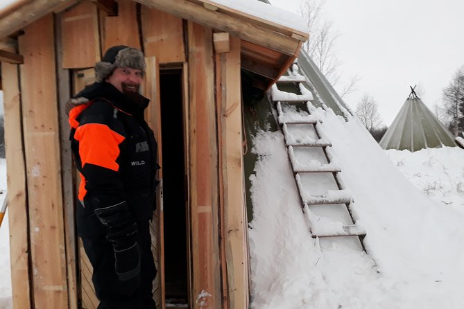Snowmobile Safari to Lake Inari, meet & feed Reindeers, Lunch - Lunch Details: BBQ Sausages, Soup, Berry Juice, and Blueberry Cake