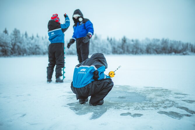 Snowmobiling and ice fishing in Apukka Resort, Rovaniemi - Cold-Weather Reality Check for Winter Lapland Days