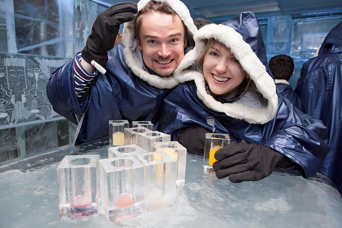 SnowVillage Visit with Entrance Tickets - Stop Two at the Ice Bar: Shots, Coffee or Tea, and Extra Time